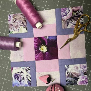 sample block with thread, scissors, and pin cushion