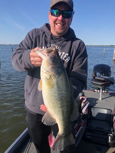 Man holding a largemouth bass