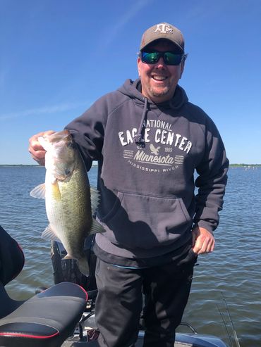 Man holding a largemouth bass