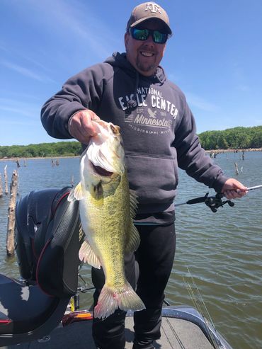 Man holding a largemouth bass
