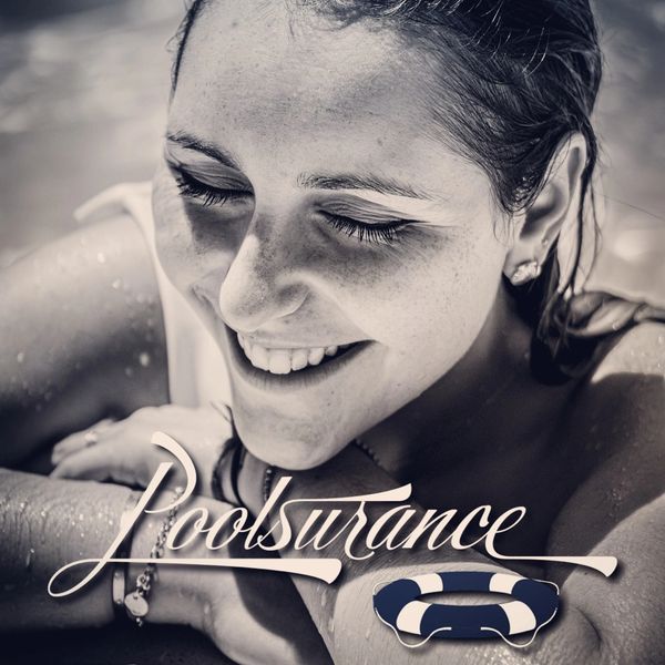 Black and white image of a smiling female swimmer 
