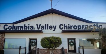 Black sign installation for Columbia Valley Chiropractic