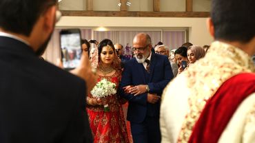 Dad walks bride up the aisle