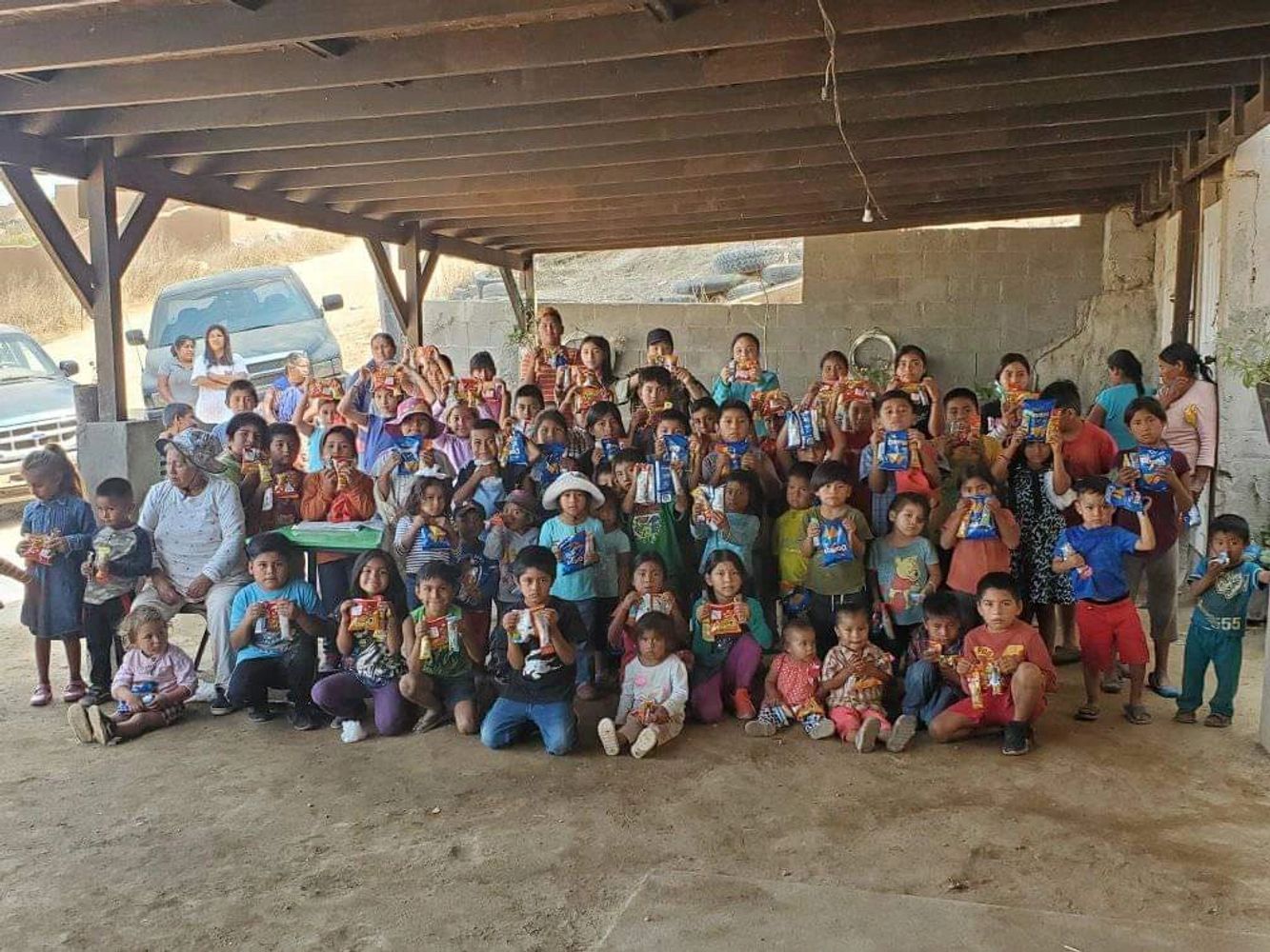 Joshua House children in Esenada, Mexico with food donated through Born Again Ministry
