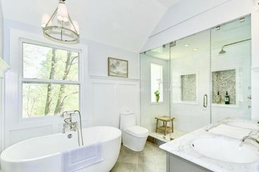Beautiful, light filled bathroom renovation w/large steam shower, double vanity & soaking tub by N+F