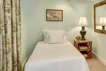 An example of Nest+Feather's Home Staging and Design Service highlighting a well appointed bedroom