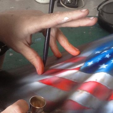 American flag airbrushed on Harley Davidson tank. 