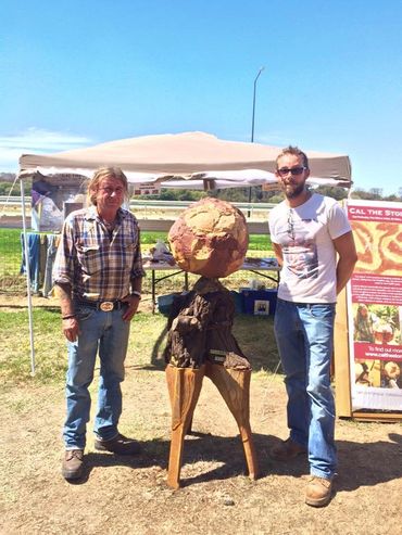 Cal the Stoner & collaborator Josh Jones at Kyneton Lost Trades Fair posing with Planet Zor