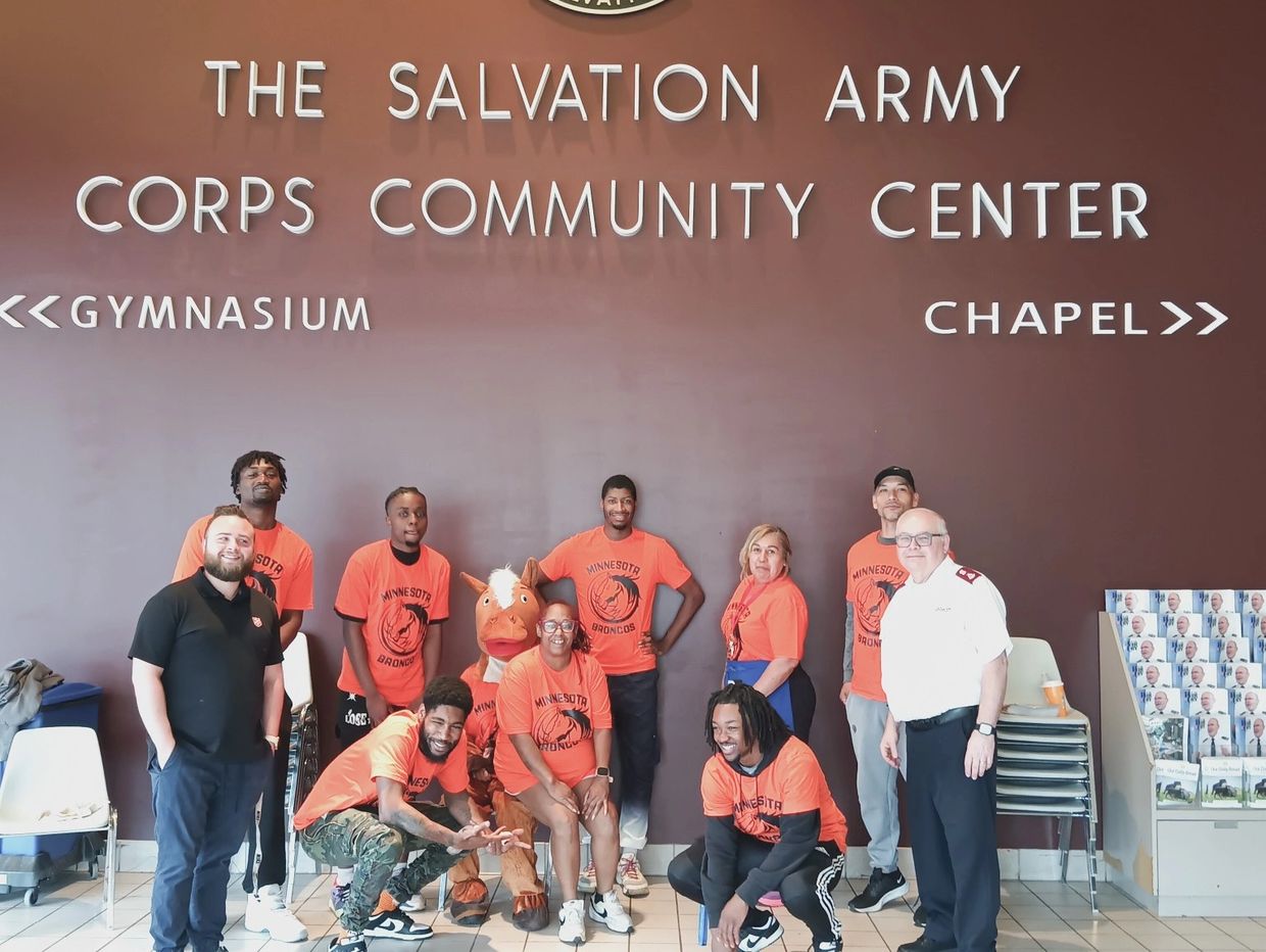 Members of the Minnesota Broncos volunteering at The Salvation Army