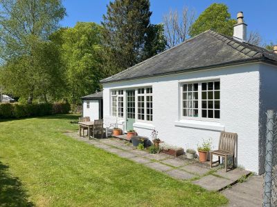 White cottage tied with the estate worker role.