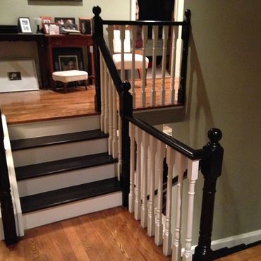 Stairs and railing stained and painted by Coverall – custom finish on Komoka home interior