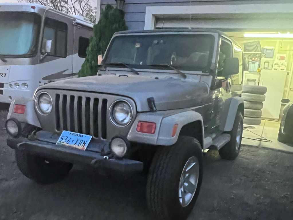 2001 Jeep Wrangler 'TJ'  Sport
Hardtop
4.0 engine
5 spd
We've done alot with this guy. Towed behind