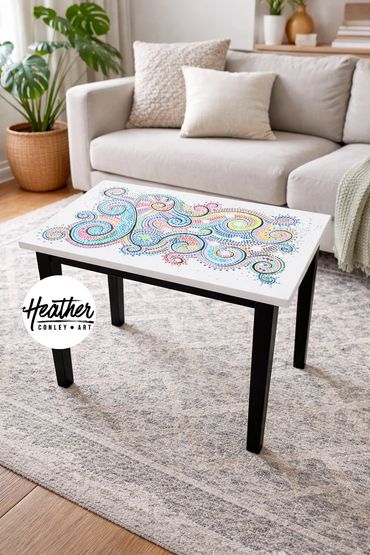 One-of-a-kind hand-painted furniture created with colorful dot patterns and intricate designs.