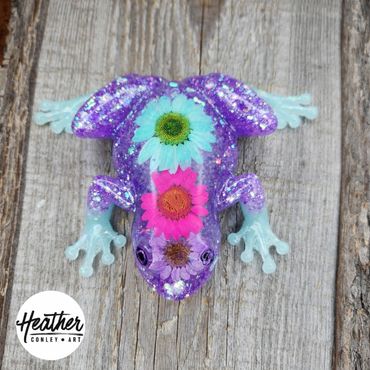 Stunnibg glow in the dark floral frog by Heather Conley