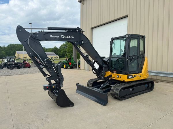 A yellow excavator in Buchanan, Michigan.