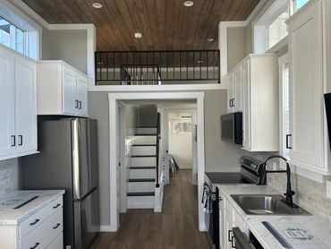 The Tiny Home Development is a purpose-built, 11.1-acre residential community designed to meet the g