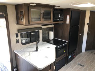 Kitchen of 2020 Forest River Cherokee available for Rent in West Michigan