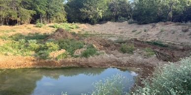 Pond Cleanup & Reshaping
Overgrown pond before cleanup, bank reshaping, vegetation removal, and gra
