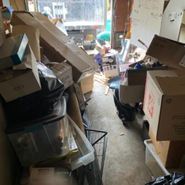 A full storage with multiple junk items inside.