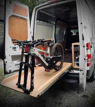Mountain bike in the back of a van