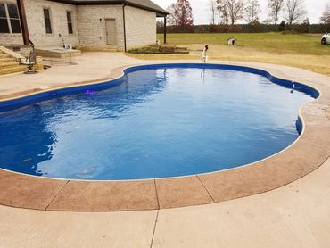 Vinyl Pool with stamped border 14' x 28'