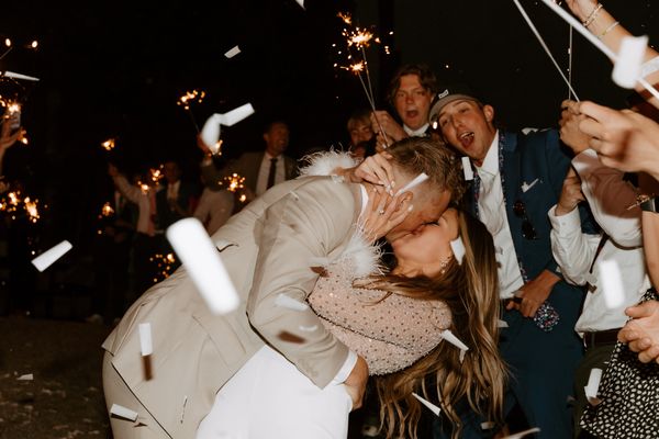 a groom and bride confetti and sparkler send-off at their wedding reception in Idaho