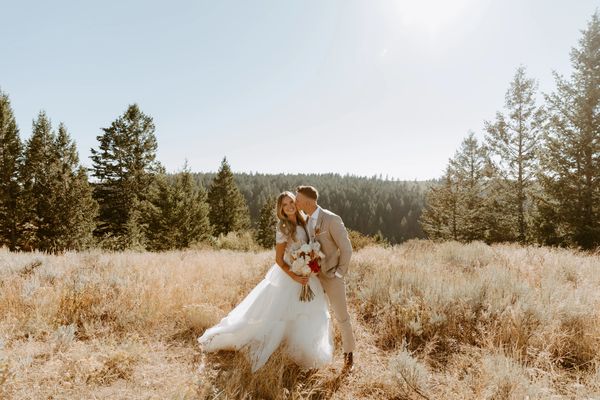 bride and groom portraits at the top of Kelly Canyon Ski Resort