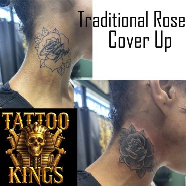 Traditional rose tattoo cover-up on neck.