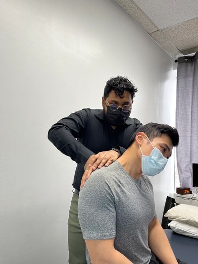 chiropractic treatment with masks