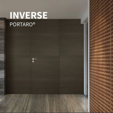 Inverse Portaro®flush interior doors blend seamlessly with panels for modern luxury and minimalistic