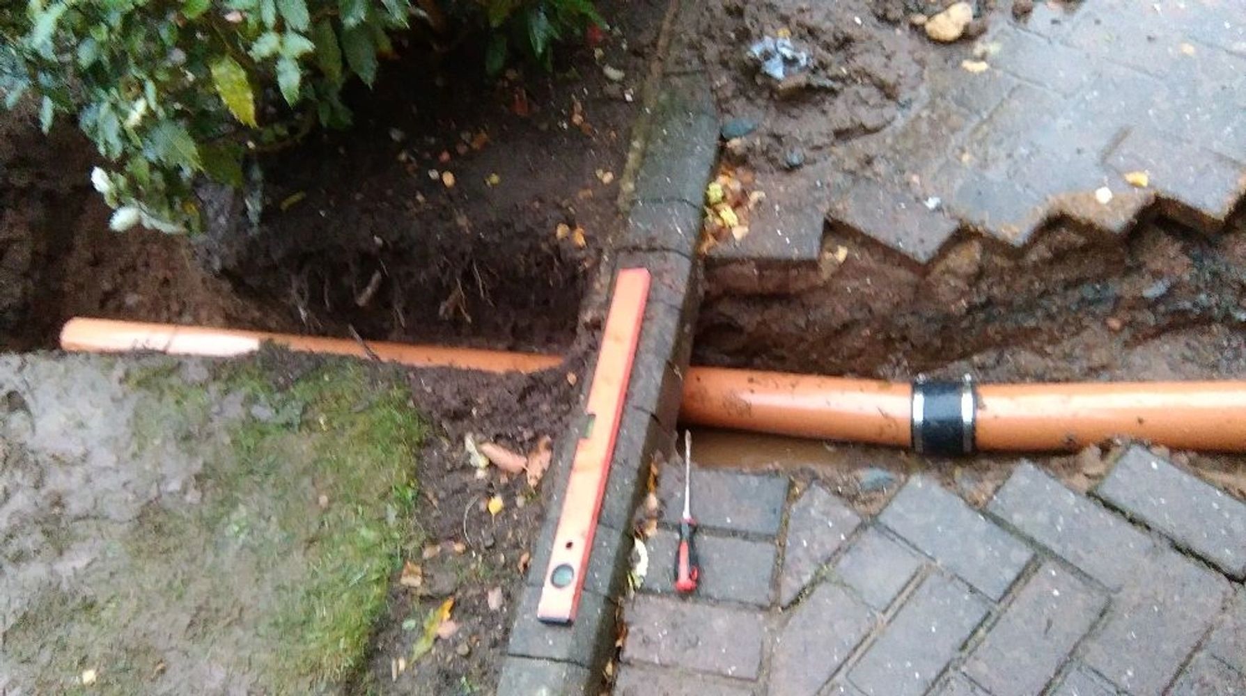Blocked and broken drain pipes are being replaced from the manhole to the soakaway.