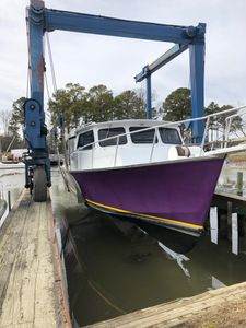 Large fishing boat hauled out of the water with a 30-Ton Travel-Lift.