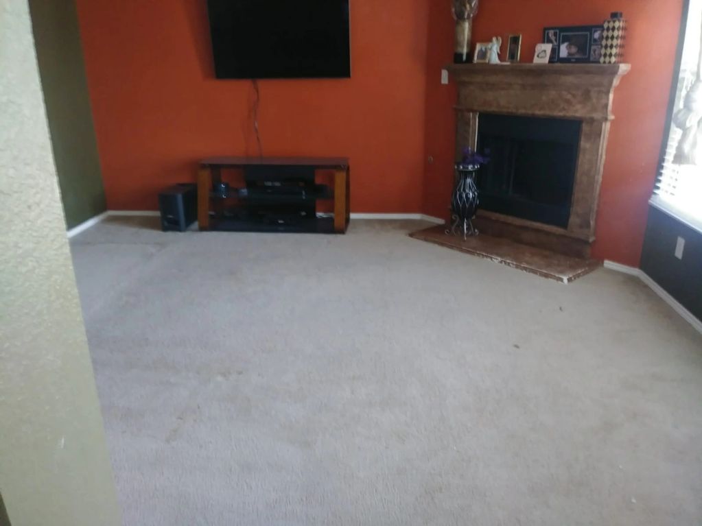 The Carpet needed to be ripped and replaced with wooden floors.