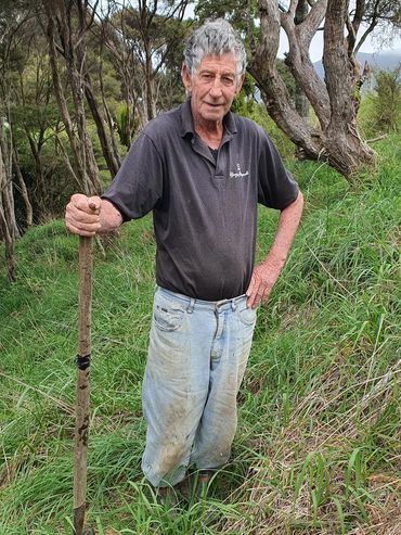 Land owner Garth planting Kauri