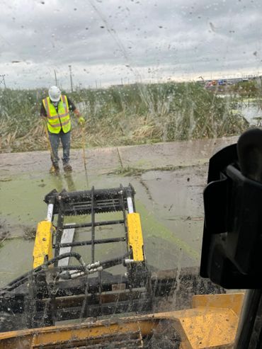 Installing composite mats in swamp