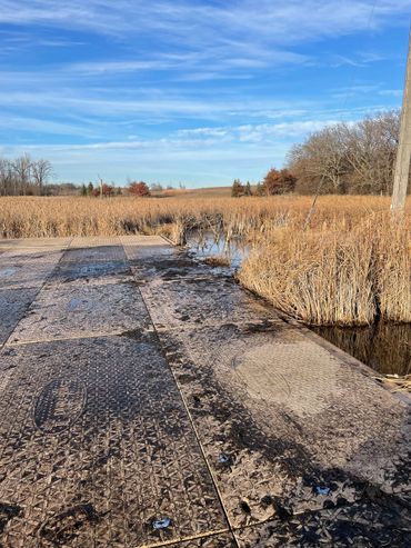 Composite mats installed in swamp