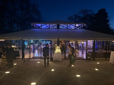 Elegant evening view of the conservatory and patio lighting at Bauknight House Estate Venue