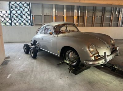 Porshe being towed in Coral Gables Parking garage