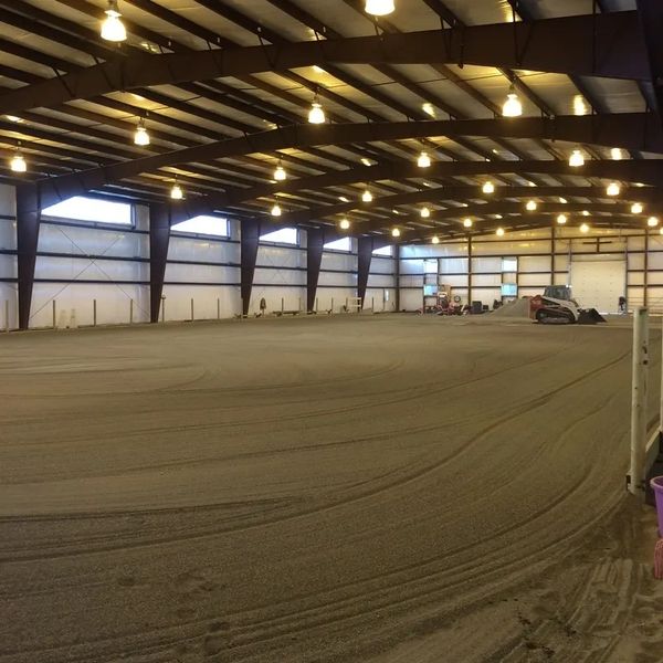 Sand and Rubber Installation for Riding Arena