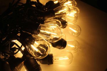 Classic festoon lights lit up.