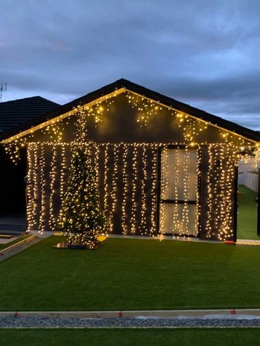 Icicle and fairy lights on house for Christmas lights.