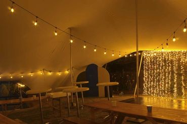 Fairy light curtain custom built for dance floor in marque for 21st birthday party.