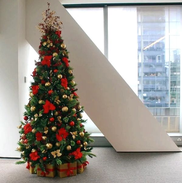 Red and gold Corporate Christmas tree at office.