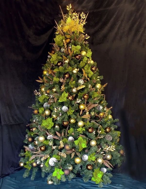 Bronze, gold and green Christmas tree decorations on 8 foot artificial pine tree with pinecones.