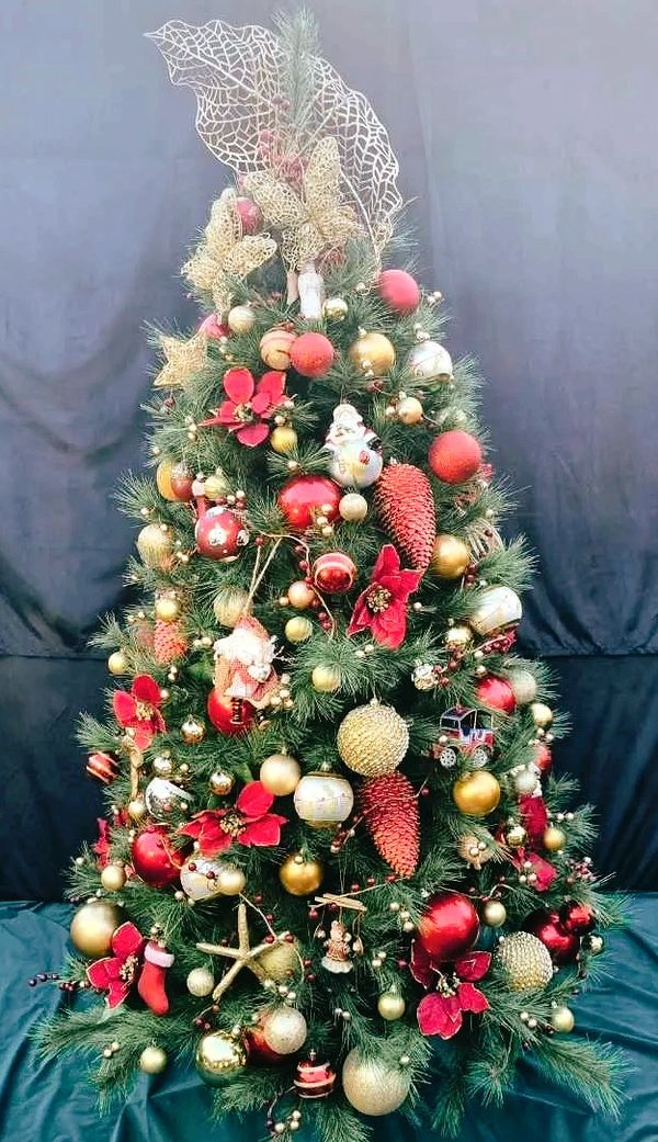 Luxury vintage Christmas ornaments on realistic 6 foot tall pine tree full decorated.