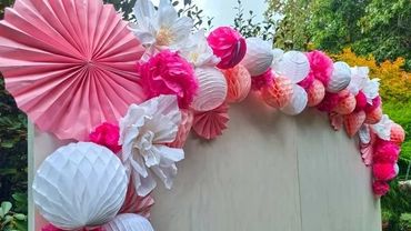 Paper decorations for party backdrop wall for Friday shower decor.