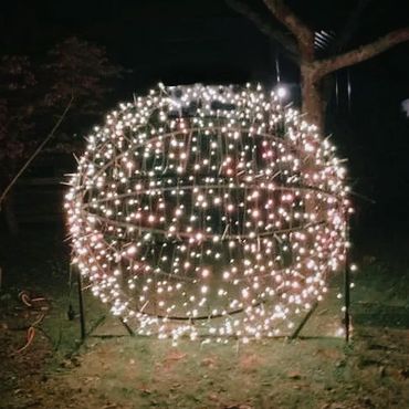 Giant fairy light sphere with commercial-grade lights.