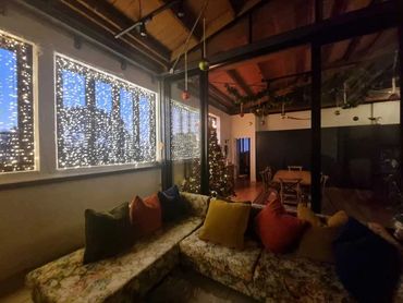 Made to measure fairy light curtain and Christmas decorations at Mt Eden apartment in Auckland.