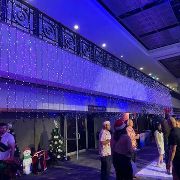 Coloured light curtain at Christmas event.
BEST VIEWED ON DESKTOP