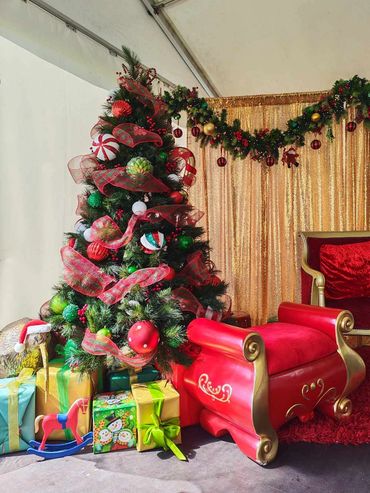 Fun and colourful Santa grotto with general Christmas vibe and toys theme for Papakura Marae 2025.